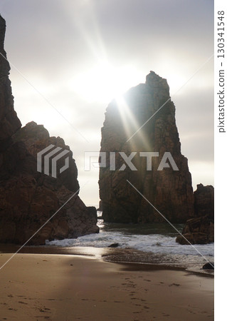Majestic Coastal Cliffs Combined with a Beautifully Serene Beachscape Await Your Visit 130341548