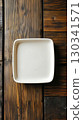 White ceramic square plate with slightly rounded edges and matte finish 130341571