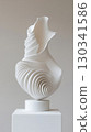 Vertical photo of smooth white ceramic shell-shaped vase with flowing organic curves 130341586