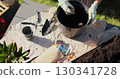 Woman hand plant a tulip bulb in pot. Home gardening. Hobbies and leisure concept. 130341728