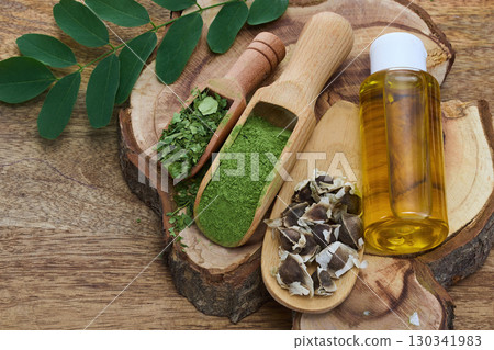 Moringa Herbal Ingredients on wooden background Moringa Herbal Ingredients on wooden background 130341983