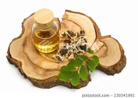 Natural Moringa Oil Display on white 130341991