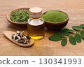 Moringa Ingredients on wooden background 130341993