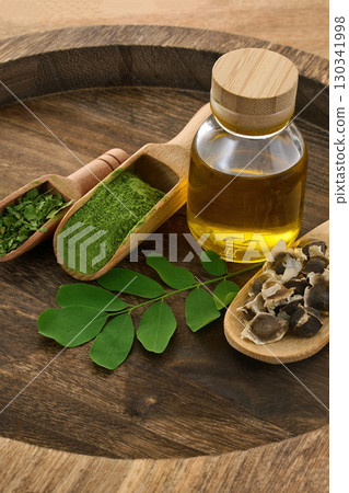 Natural moringaIngredients Display on wooden background Natural moringaIngredients Display on wooden background 130341998