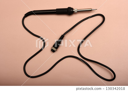 Black soldering iron. Soldering iron for mounting radio elements. Black soldering iron. Soldering iron for mounting radio elements. 130342018