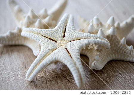 Starfish on a wooden table 130342255