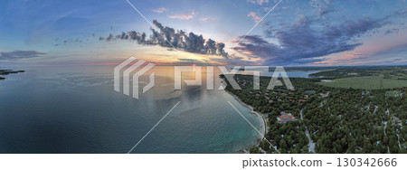Sunset clouds over the Adriatic coast panorama. Istria, Croatia. 130342666