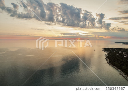Sunset clouds over the Adriatic coast. Istria, Croatia. 130342667