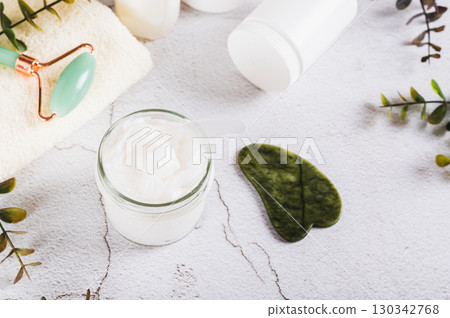 Moisturizing cream with beef tallow in a jar on the table 130342768