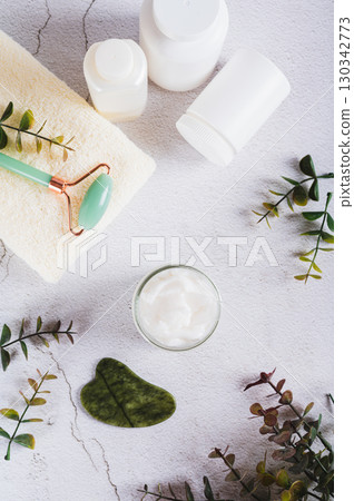 Moisturizing cream with beef tallow in a jar on the table top and vertical view Moisturizing cream with beef tallow in a jar on the table top and vertical view 130342773