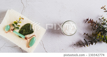 Moisturizing cream with beef tallow in a jar on the table top view web banner 130342774