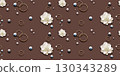 An elegant pattern of white flowers and jewelry against a muted brown background 130343289