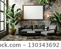 Stylish living room with a comfortable sofa and decorative pillows.Empty frame on the wall 130343692