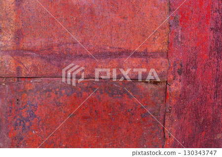 Texture of Worn red painted surface with seams, scratches and discoloration Texture of Worn red painted surface with seams, scratches and discoloration 130343747
