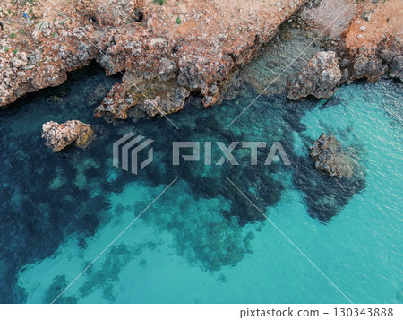Rocky shoreline with crystal Rocky shoreline with crystal 130343888