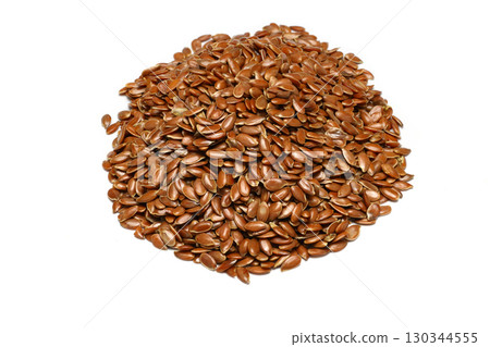 Pile of flax seeds isolated on white background 130344555