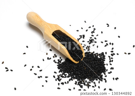Black cumin seeds isolated on white background. Heap of black nigella seeds. Nigella sativa. Top view. 130344892