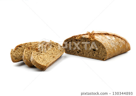 Sliced homemade sourdough rye bread with rye flour on white textured background. Top view or flat-lay. 130344893