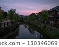 Sunset in a city with waterways 130346069
