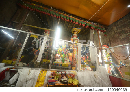 Idols and sacred objects in Hinduism inside at Spituk Monastery, also known as Spituk Gompa or Petup Gompa, is a Buddhist monastery located in the Leh district of Ladakh, India. 130346089