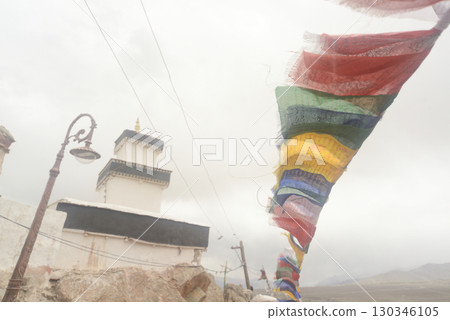 Flutters sutra streamer. China, Tibet, the Buddhist scriptures written on the flag, Spituk Monastery, also known as Spituk Gompa or Petup Gompa, is a Buddhist monastery. Flutters sutra streamer. China, Tibet, the Buddhist scriptures written on the flag, Spituk Monastery, also known as Spituk Gompa or Petup Gompa, is a Buddhist monastery. 130346105