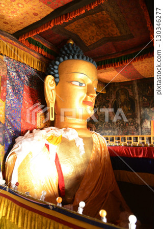 Face of Sakyamuni Buddha, a large golden Buddha statue in the Shey Palace. The Shey Monastery or Gompa and the Shey Palace complex are structures located on a hillock to the south of Leh in Ladakh. Face of Sakyamuni Buddha, a large golden Buddha statue in the Shey Palace. The Shey Monastery or Gompa and the Shey Palace complex are structures located on a hillock to the south of Leh in Ladakh. 130346277
