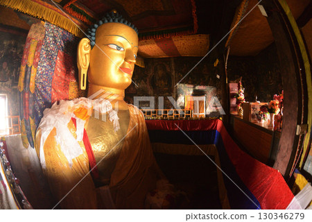 Face of Sakyamuni Buddha, a large golden Buddha statue in the Shey Palace. The Shey Monastery or Gompa and the Shey Palace complex are structures located on a hillock to the south of Leh in Ladakh. Face of Sakyamuni Buddha, a large golden Buddha statue in the Shey Palace. The Shey Monastery or Gompa and the Shey Palace complex are structures located on a hillock to the south of Leh in Ladakh. 130346279