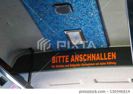 A sign in German saying "Fasten your seat belt" A sign in German saying "Fasten your seat belt" 130346814