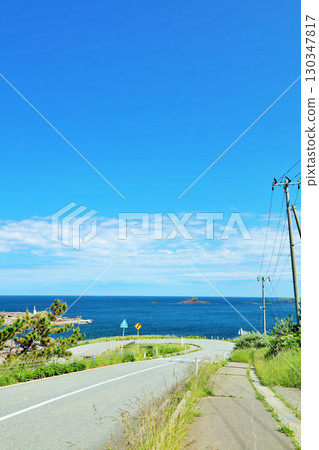 Akita Prefecture Road on the Oga Peninsula under the blue sky Akita Prefecture Road on the Oga Peninsula under the blue sky 130347817