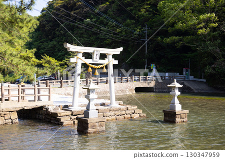 Tsushima Watatsumi Shrine Torii Gate Standing in the Sea 130347959