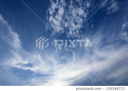 Clouds lit by sunlight before sunset 130348725