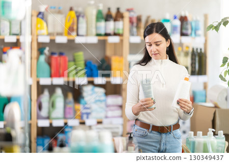 woman went to a hardware store in Spain for suntan products and SPF woman went to a hardware store in Spain for suntan products and SPF 130349437