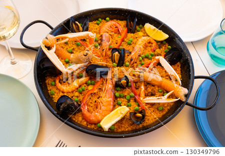 National dish of Spanish cuisine is Paella with seafood National dish of Spanish cuisine is Paella with seafood 130349796