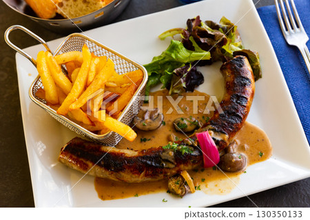 Grilled sausages with potato, mushrooms and greens Grilled sausages with potato, mushrooms and greens 130350133