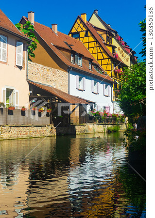 Summer view of Little Venice quarter in Colmar on banks of canal, France 130350136