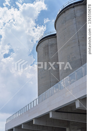 Cement silo under clear sky 130350678