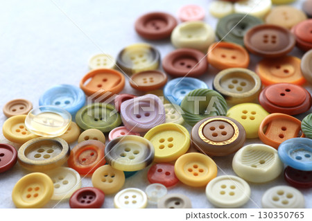 Group photo of colorful buttons used in dressmaking 130350765