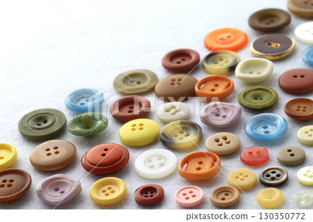 Group photo of colorful buttons used in dressmaking 130350772