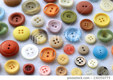 Group photo of colorful buttons used in dressmaking 130350773