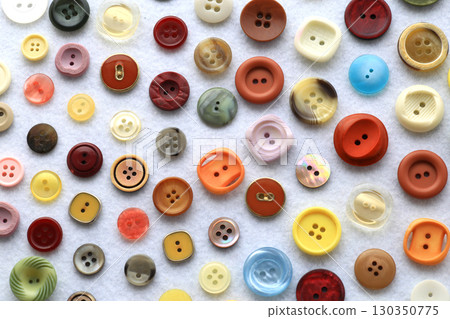 Group photo of colorful buttons used in dressmaking 130350775