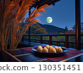 Illustration of a full moon shining in the autumn night sky and moon-viewing dumplings 130351451
