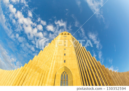 Unique architecture of Hallgrimskirkja church under a blue sky in Reykjavik, Iceland 130352594