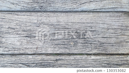Rustic weathered wooden plank background texture for a natural vintage design surface 130353082