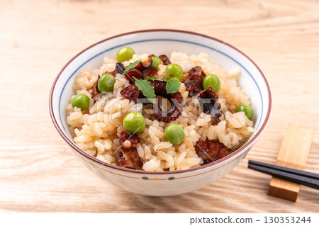 Octopus rice with green peas 130353244