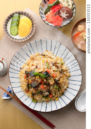 Home-style fried rice set meal with mackerel jerky | Japanese cuisine image of steaming freshly cooked rice, miso soup, and side dishes 130353515