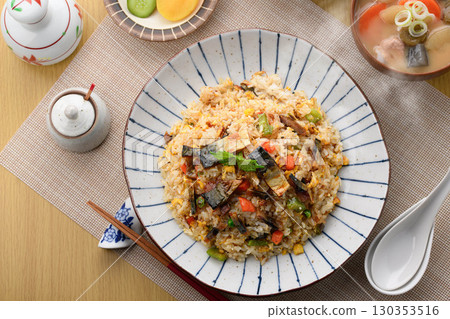 Home-style fried rice set meal with mackerel jerky | Japanese cuisine image of steaming freshly cooked rice, miso soup, and side dishes Home-style fried rice set meal with mackerel jerky | Japanese cuisine image of steaming freshly cooked rice, miso soup, and side dishes 130353516