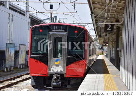 Shinano Railway Karuizawa Station platform and train in Nagano Prefecture 130356397