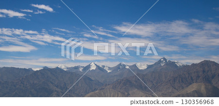 Mountain peaks of the Zanskar Range seen from Leh Palace, India. 130356968