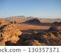 Wadi Rum, where shadows gradually fall under clear skies 130357371