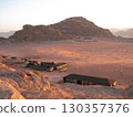 Wadi Rum dyed red at dusk 130357376